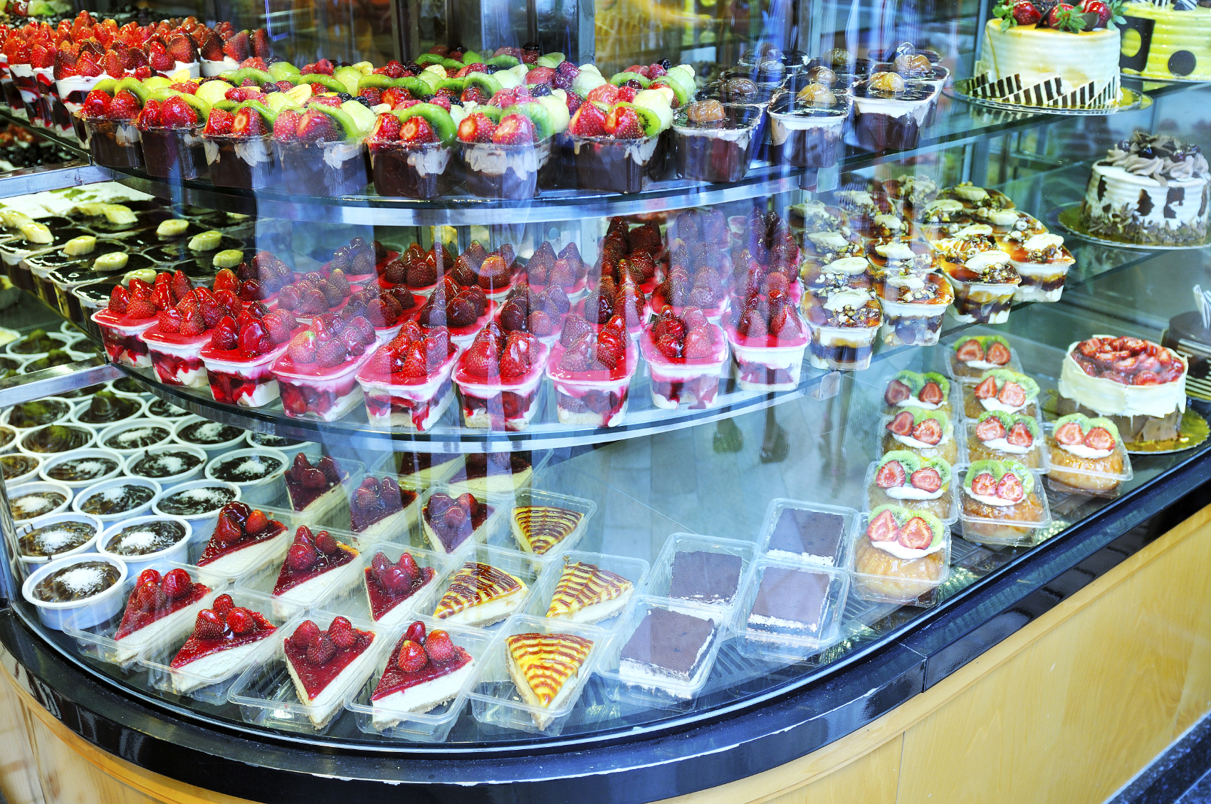 Glass show window of confectionery shop.